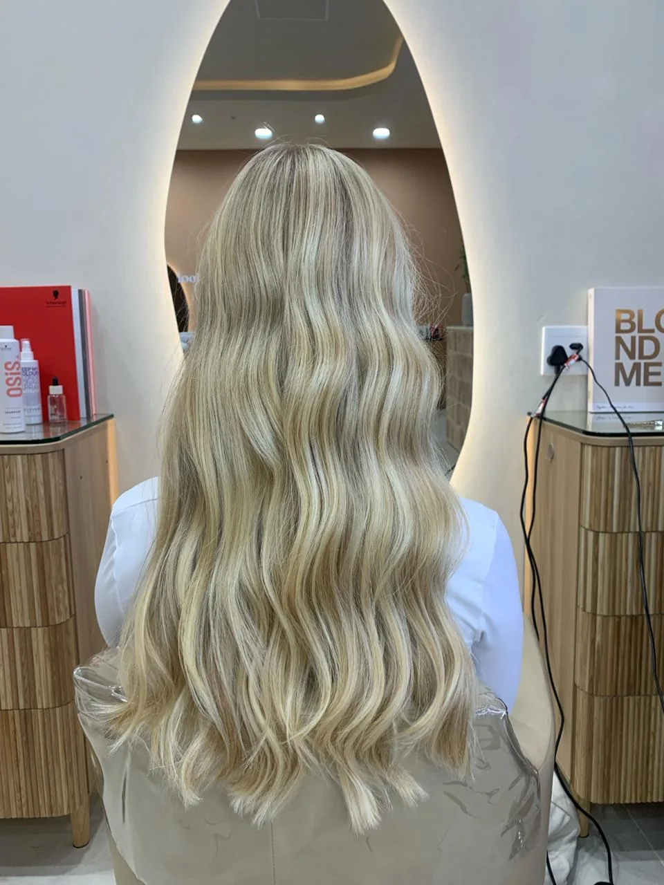 After: Brightened blonde with soft dimension and a glossy finish.
