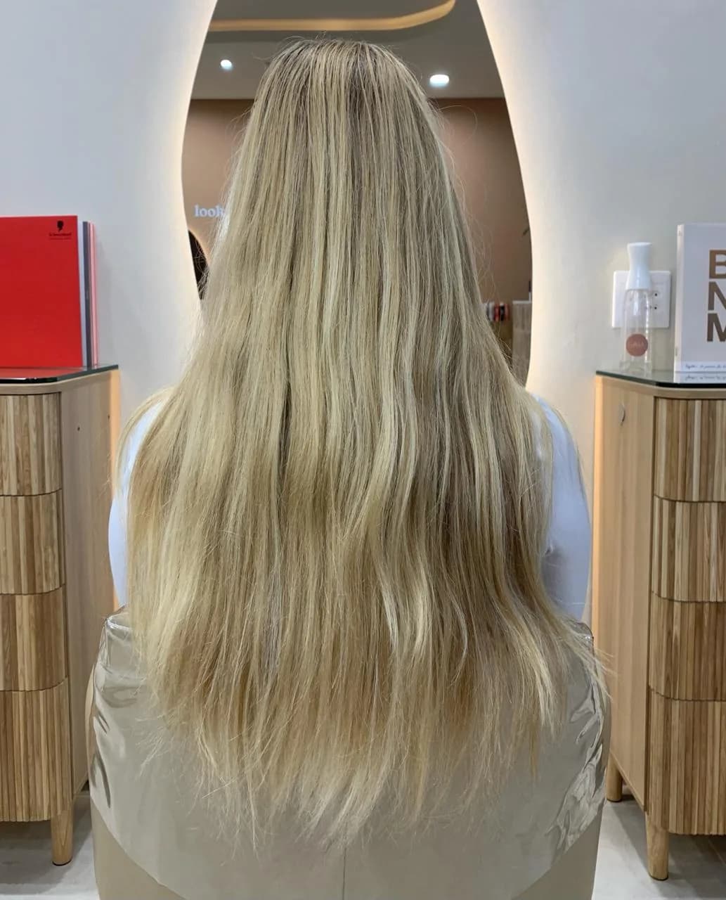 Before: Brightened blonde with soft dimension and a glossy finish.