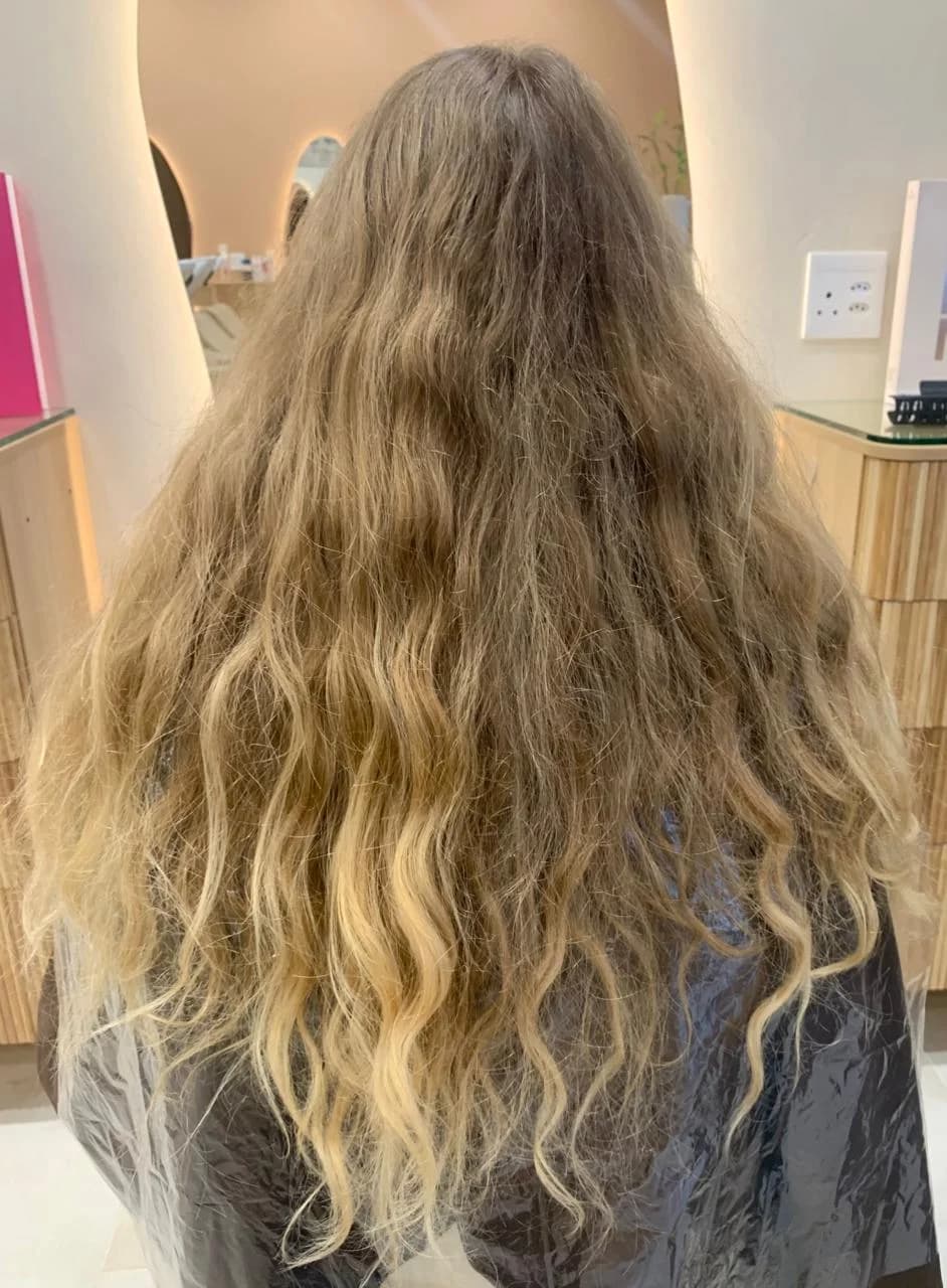 Before: Dimensional highlights. A soft, lived-in blonde with movement.