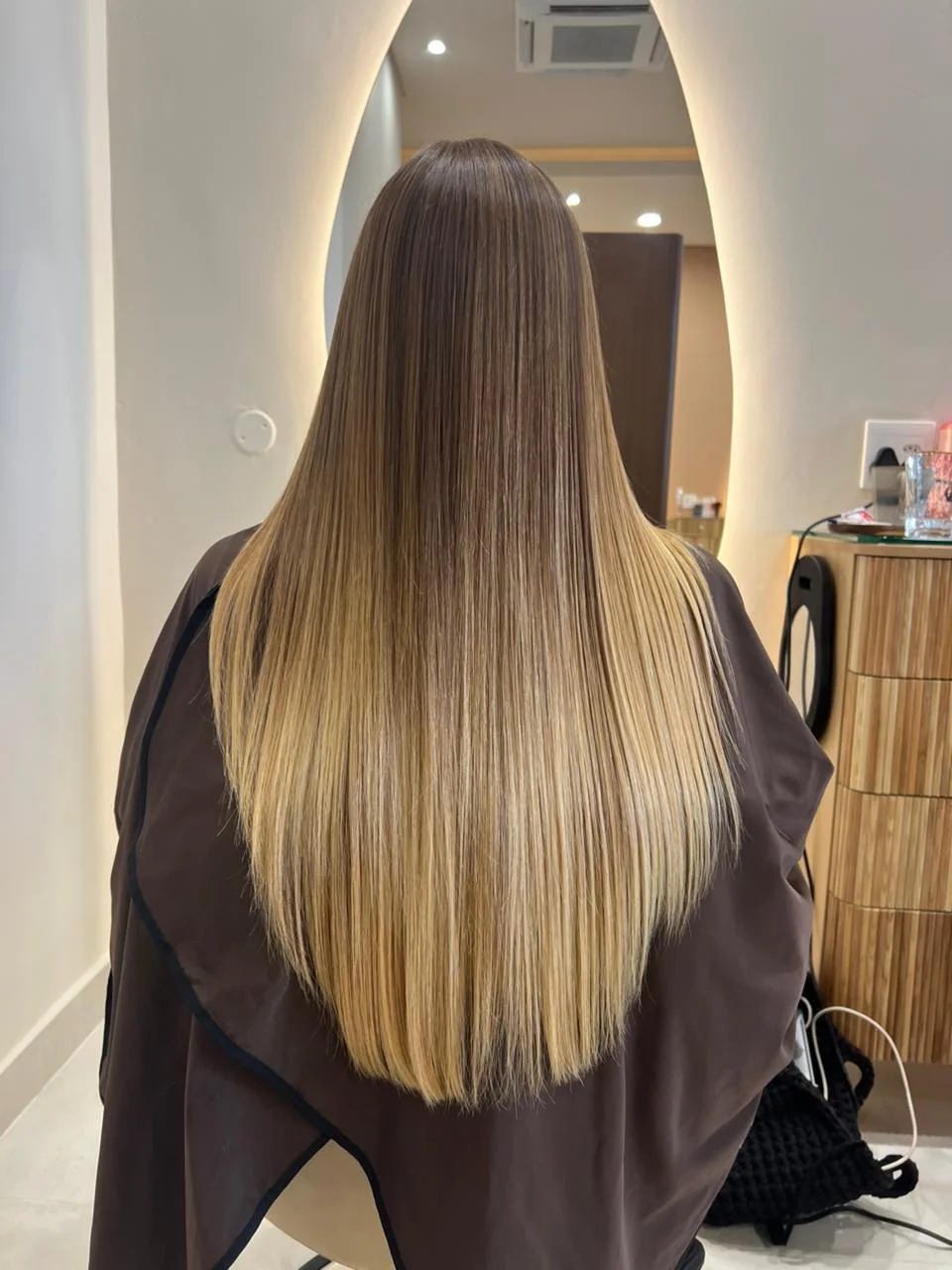 After: INOAR Japanese Silk. Air-dried waves taken to a sleek, glossy finish.
